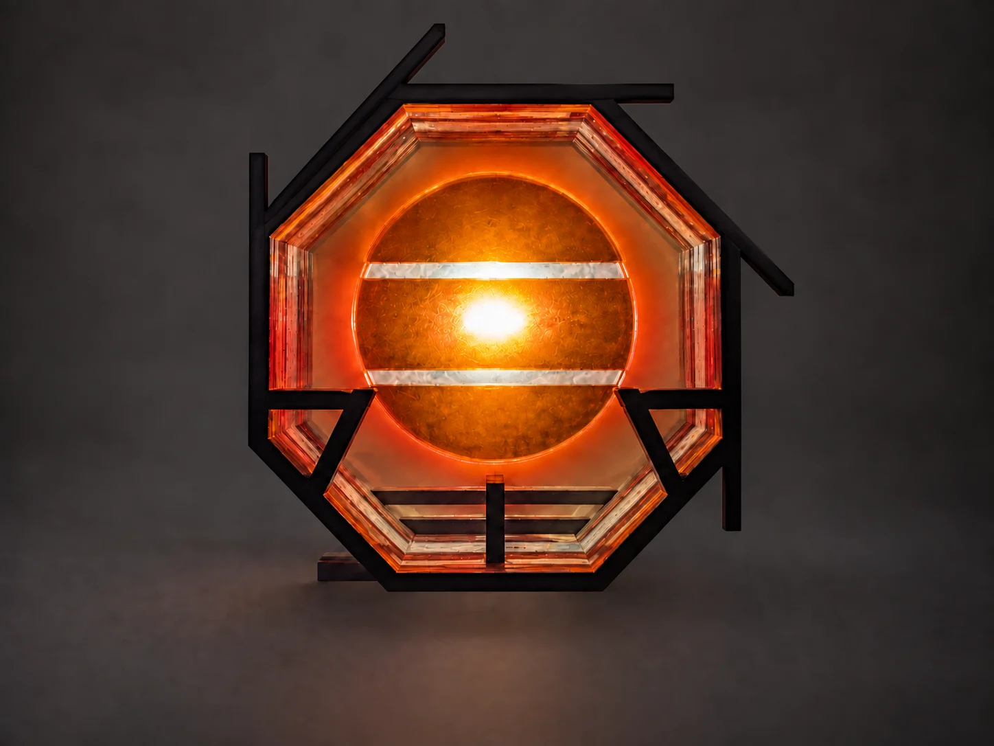 Cyberset's illuminated orange diffuser and layered octagonal frames
