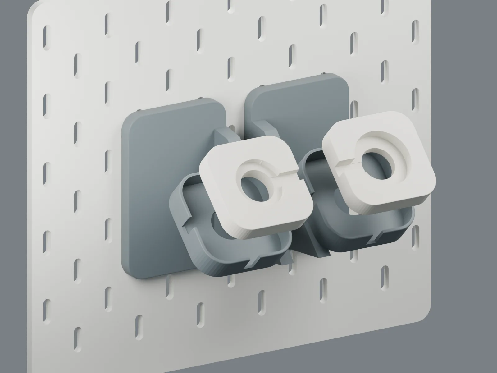 Exploded CAD view showing removable square charger inserts and the common holder design